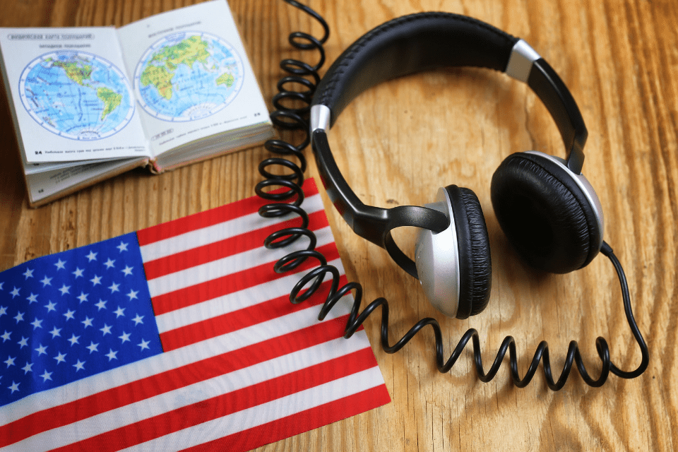 Course Language and Headphones on the Table